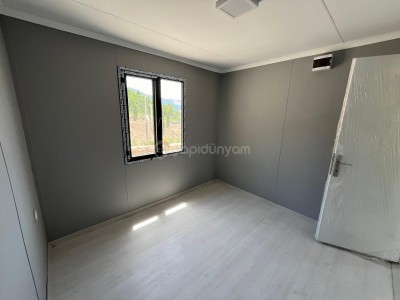 63 M2 AHŞAP KAPLAMA BETOPANLI EV KONTEYNER